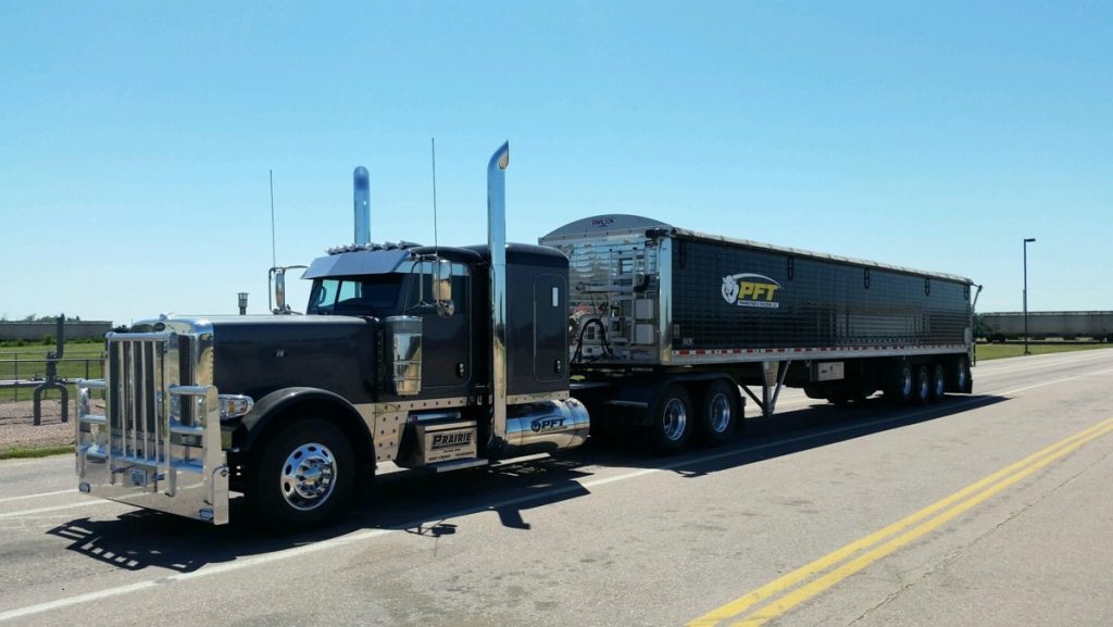 A delivery truck for PFT Prairie Feed & Trucking in Milford, IA.